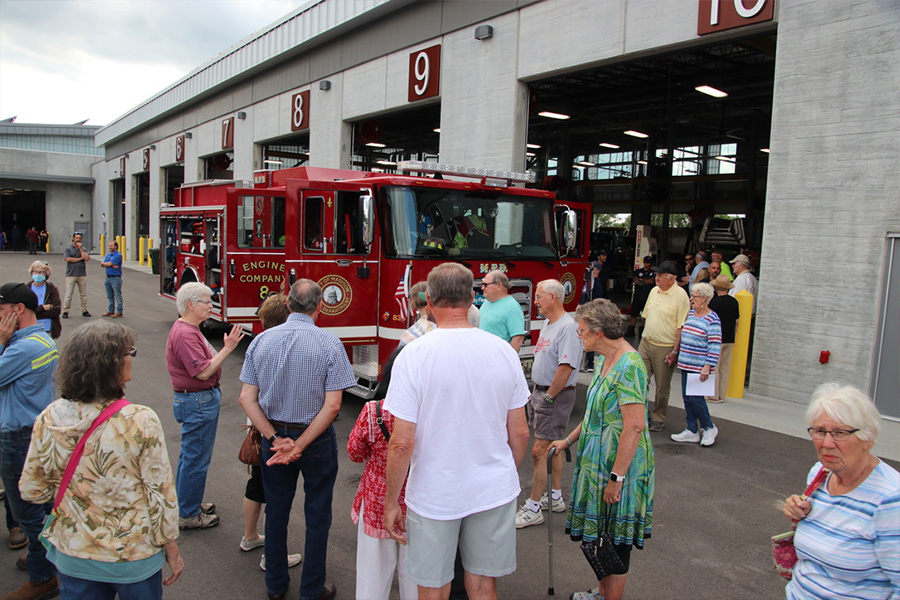 Attendees look at the new electric Fire Engine 8