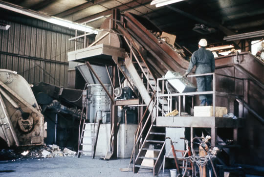 Hammermill at transfer station facility, circa 1970s